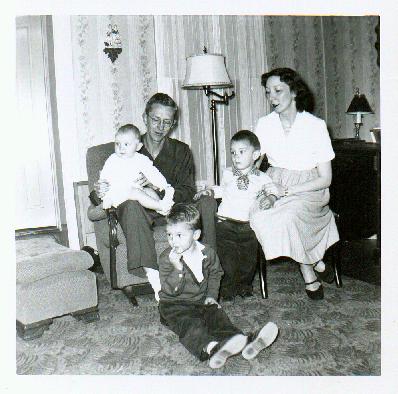 Mom & Dad with three kids, circa 1954.